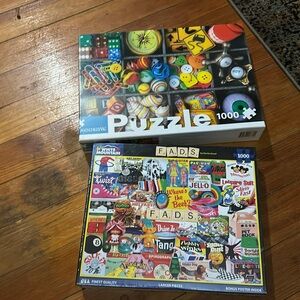 New in plastic (2) 1000 piece puzzles